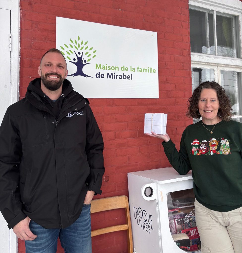 CEO of AC & Heating Equipment Rental making a donation.